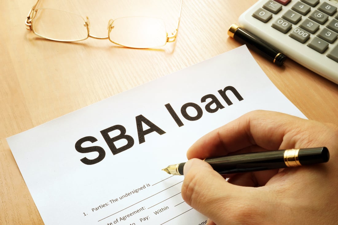 SBA loan form on a table.